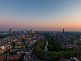 Fototapeta na wymiar Aerial of the historic Utrecht city center and modern transit oriented development showing a contrast between old and new