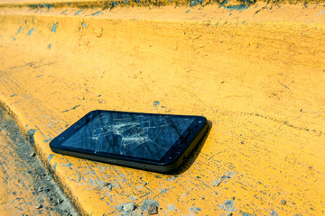 the phone lies on a rough concrete surface architectural and urban object