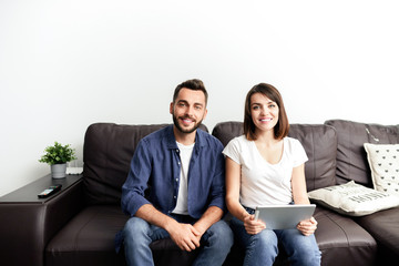 Portrait of young couple at home