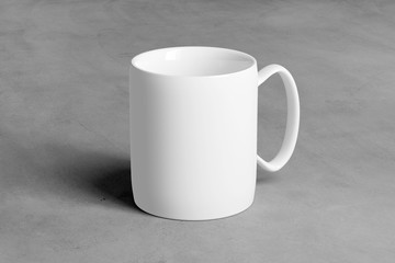 Mock up of a Ceramic mug on a concrete background