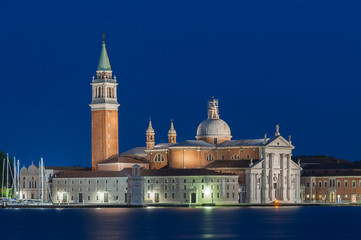 Fototapeta na wymiar The church and monastery on island San Giorgio Maggiore in the lagoon of Venice, Italy