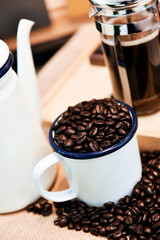 Coffee beans in vintage cup