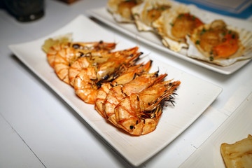 A plate of grilled prawn or shrimp, Barbecue seafood party, Traditional Thai food recipe.