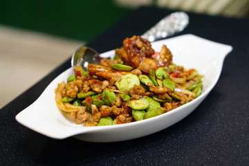 Stir-Fried Twisted cluster bean (Bitter bean or Stink bean) with shrimps paste, Traditional Thai food recipe, Popular in Thailand.