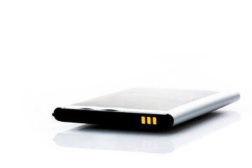 Swollen old battery on background