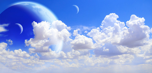 Obraz na płótnie Canvas Fantastic sky with white clouds and three planets