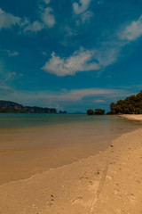 Standing on the beach looking at the differents clouds.
