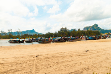 Fototapeta na wymiar Looking at the boats on the beach
