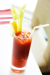 Organic fresh Tomato juice in glass on table