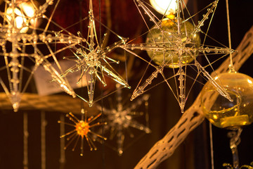 Christmas souvenirs on the counter in Europe, Painted glass Christmas balls with fairy tales.