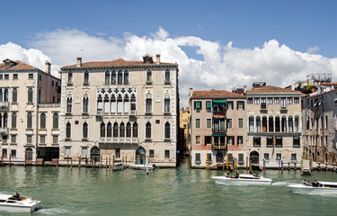 Fototapeta premium View across the Grand Canal in Venice towards the Palazzo Querini Dubois and smaller Palazzo Dona