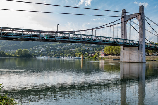 View on the suspension bridge on the Rhone river, Condrieu, France