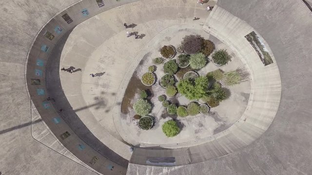 Slow aerial 4k descending shot of main building in Jardin Botanico in Medellin