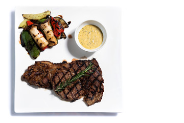 Delicious beef steak on plate,top  view