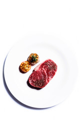 Fresh raw marble beef steak on plate