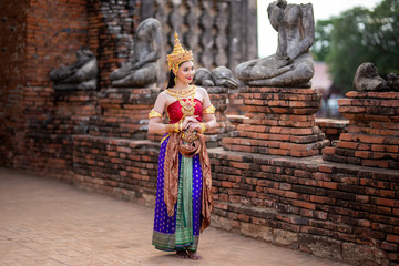 Fototapeta na wymiar Portrait of Asian women with Thailand Traditional dresses against temple