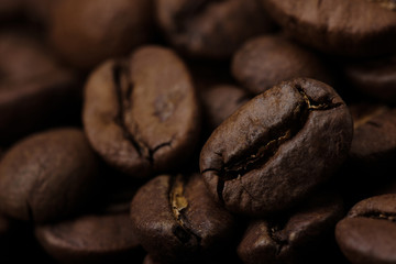 roasted coffee beans background close up. macro shot