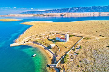 Stone desert island of Zecevo church aerial view