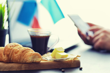 Fresh pastries on the table. French flavored croissant.