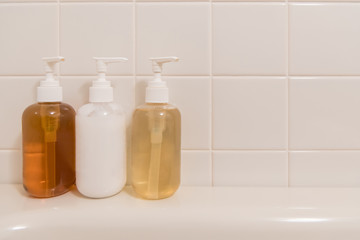 toiletry bag with travel toiletries, small plastic bottles of hygiene products and soap, Hotel Guest Room Supplies