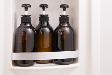 toiletry bag with travel toiletries, small plastic bottles of hygiene products and soap, Hotel Guest Room Supplies