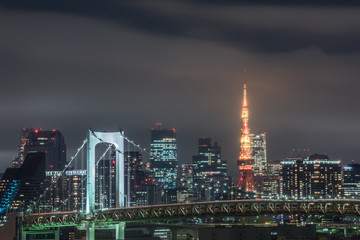 Panoramic modern city skyline bird eye aerial view of Tokyo bay under rainy night