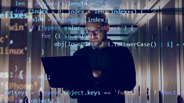 IT engineer is operating a laptop with encrypted code going above him