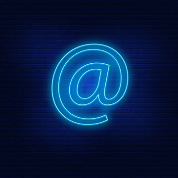 Neon lights commercial at, @. Bright commercial advertising at . Modern vector logo, banner, shield, commercial at, @drawing. Night advertising on the background of a brick wall.