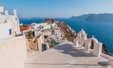 Beautiful blue sea and white buildings at Santorini island.