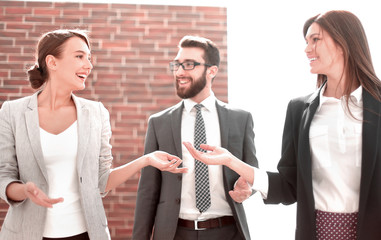 group of employees on the background of the office