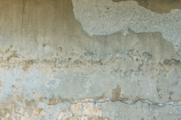 Weathered and cracked cement wall texture close up for background use
