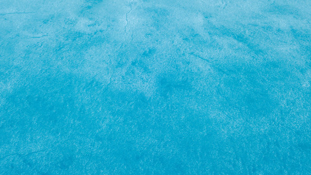 Blue Ice surface of Frozen Lake from drone aerial view at Pangong Lake or Pangong Tso, Tso moriri – Nubra, India. Abstract concept of Cold winter, peaceful and freedom.