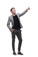 in full growth. surprised man pointing to copy space