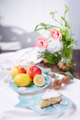 apple pie on a blue plate. lemon with apples