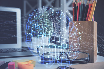 Brain drawings with glasses on the table background. Double exposure.