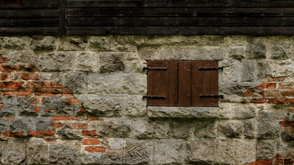 old window in stone wall