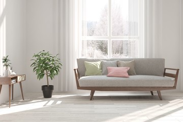 Stylish room in white color with sofa and winter landscape in window. Scandinavian interior design. 3D illustration