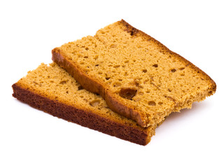 Sliced honey cake isolated on white background