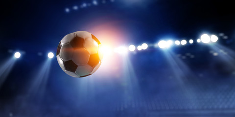 Soccer ball flight over stadium