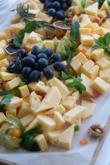 sliced ​​cheese with greens table healthy food