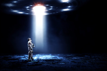 Obraz premium Spaceman and his mission. Mixed media