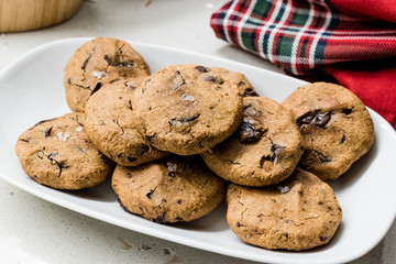 Paleo Chocolate Chip Cookies Made with Coconut and Almond Flour on Baking Sheet / Paper.
