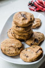 Paleo Chocolate Chip Cookies Made with Coconut and Almond Flour on Baking Sheet / Paper.