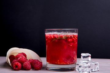 Glass of fresh strawberry smoothie and fresh strawberries . Healthy food and drink concept.