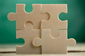 Creative solution for idea - business concept, jigsaw puzzle on the blackboard