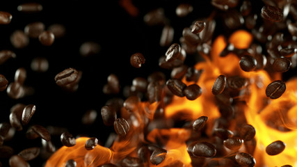 Fresh roasted coffee beans with flames