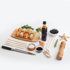 Composition of accessories for making rolls, sauce and spices