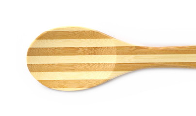 Empty wooden spoon isolated on white background