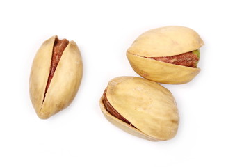 Pistachios, macro, isolated on white background, top view