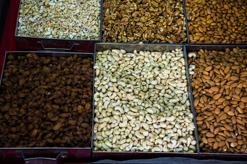 Healthy fresh Dry fruits on display for sale in bazaar like cashews , almond etc. Background - Image